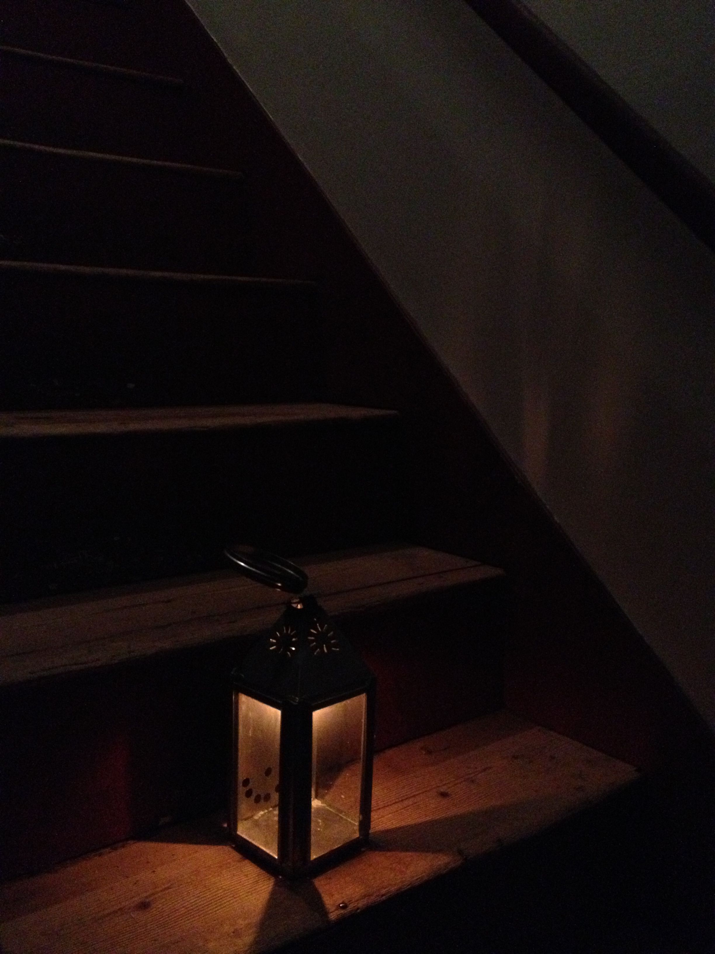 A lantern lights the stairs next to Jackson's room