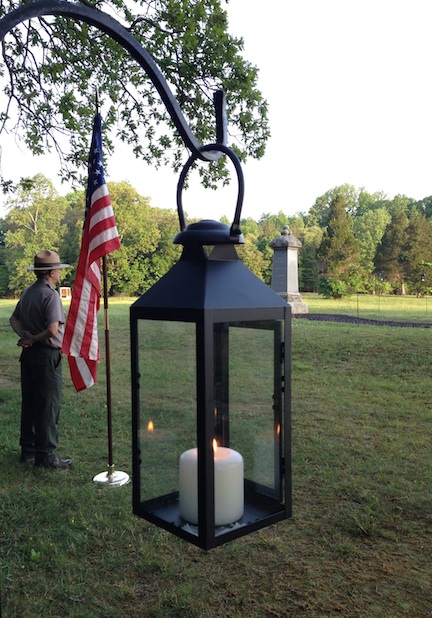 NPS Historian Richard Chapman stands at attention as a "silent sentinel."