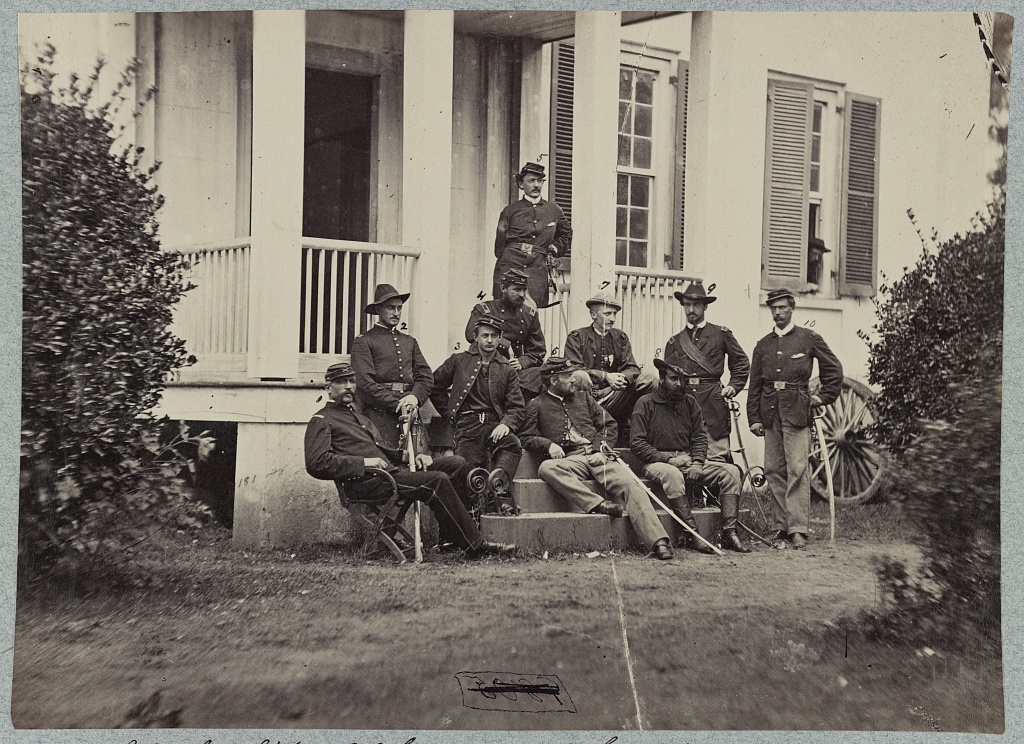 James Wilson, seated in the center facing the viewer's right, with his staff at City Point Virginia in 1864.  Courtesy of the Library of Congress