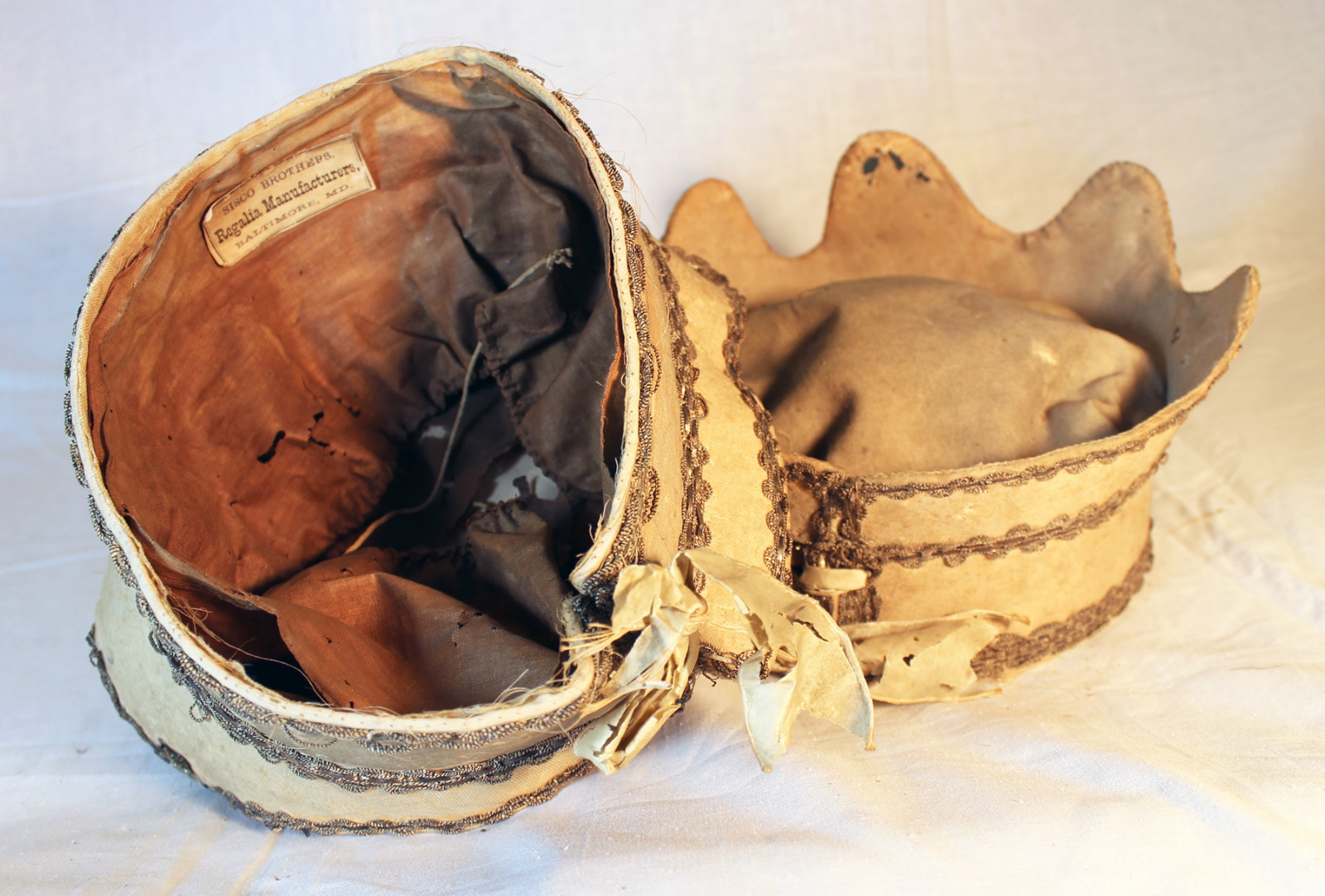 Interior of one hat with the Sisco brothers label. Note the cording, similarities in construction, material and overall design. eBay listing 2014.