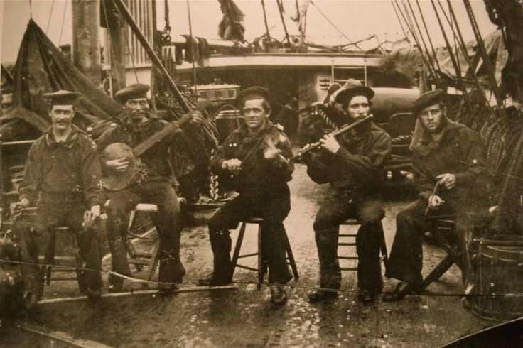 Men aboard the USS Wabash formed a minstrel group, and Henry Moore photographed them while in Port Royal